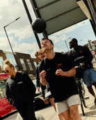 AOF X Guinness Post Match Guinness Tee | Black | Art Of Football